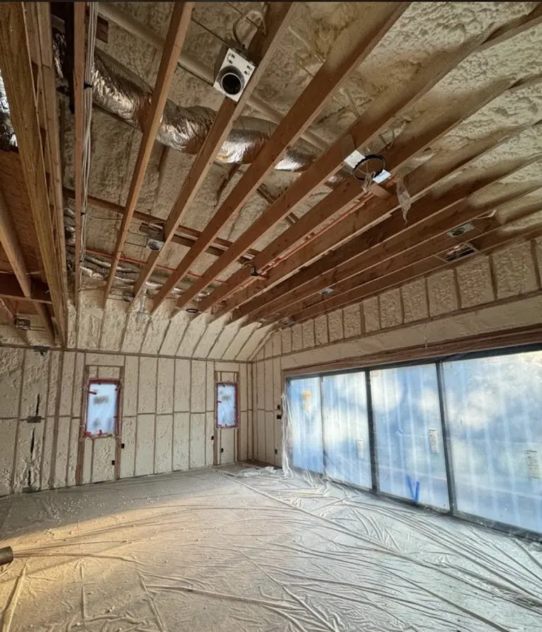 Interior walls and ceiling insulated with spray foam during new construction in Steiner Ranch